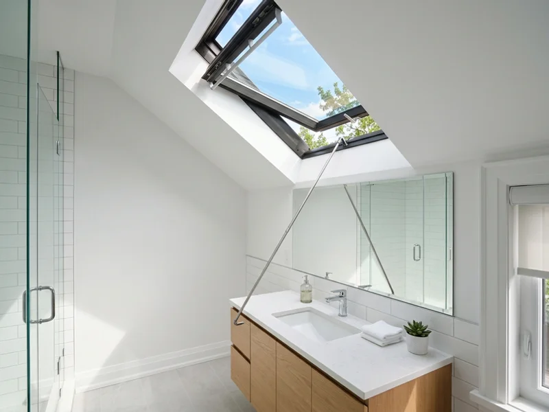 Velux VS venting skylight open above a bathroom vanity
